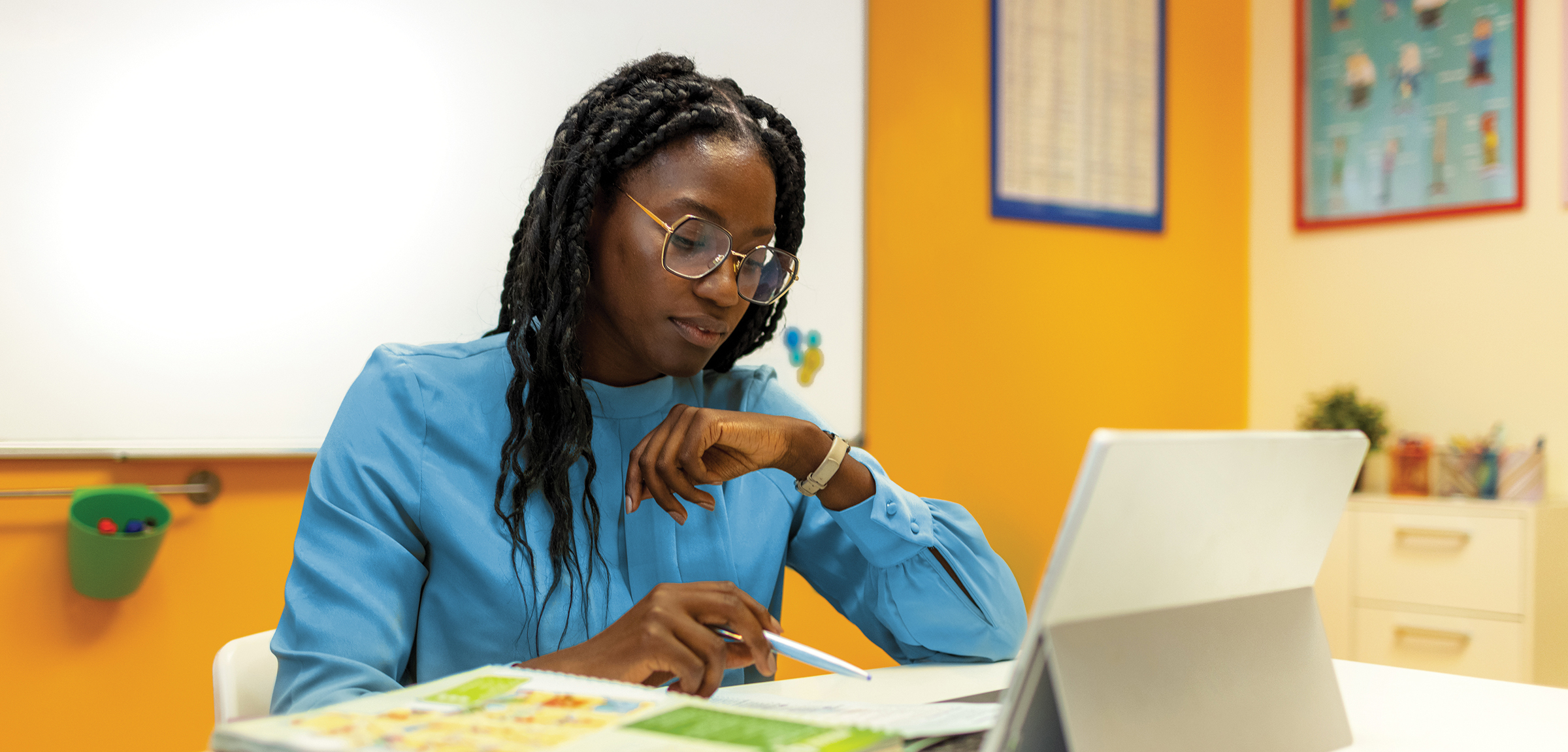 A woman working on a laptop