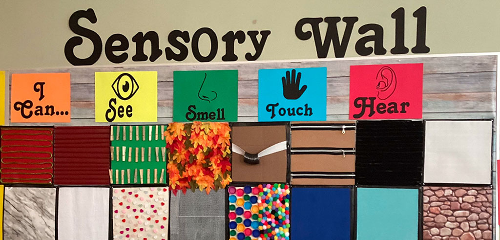 Sensory wall with an array of textures and smells