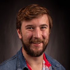 Portrait of man wearing a jean jacket