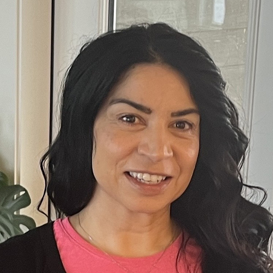 Portrait of a brunette curly haired women