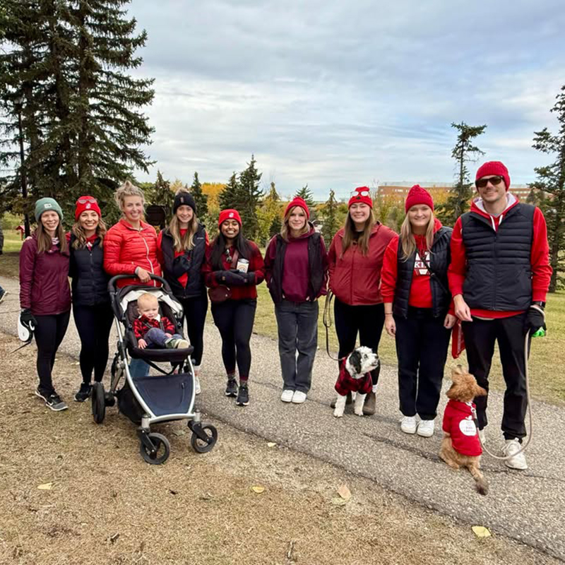 A group of people participating in a wellness walk