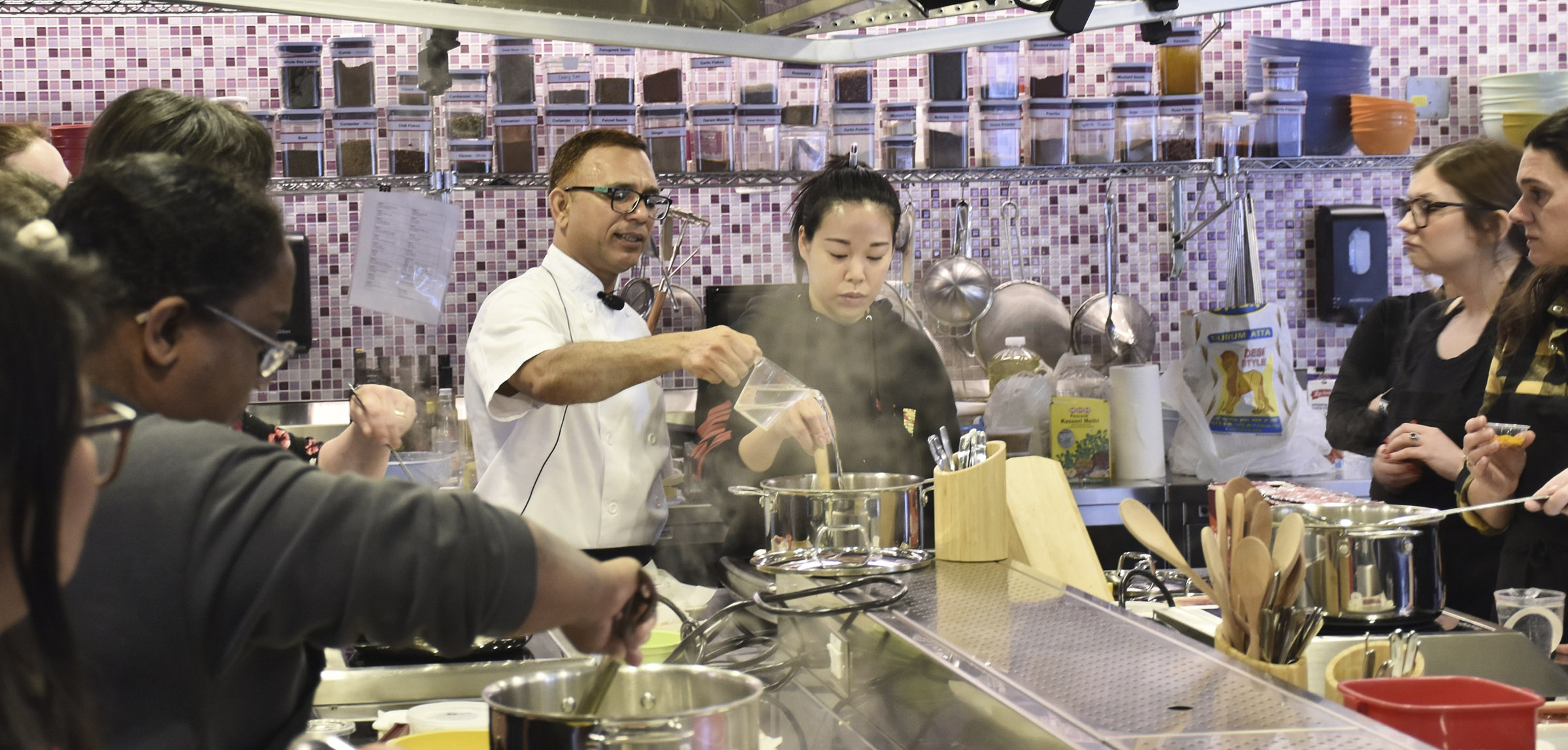 GETCA attendees participate in a cooking class