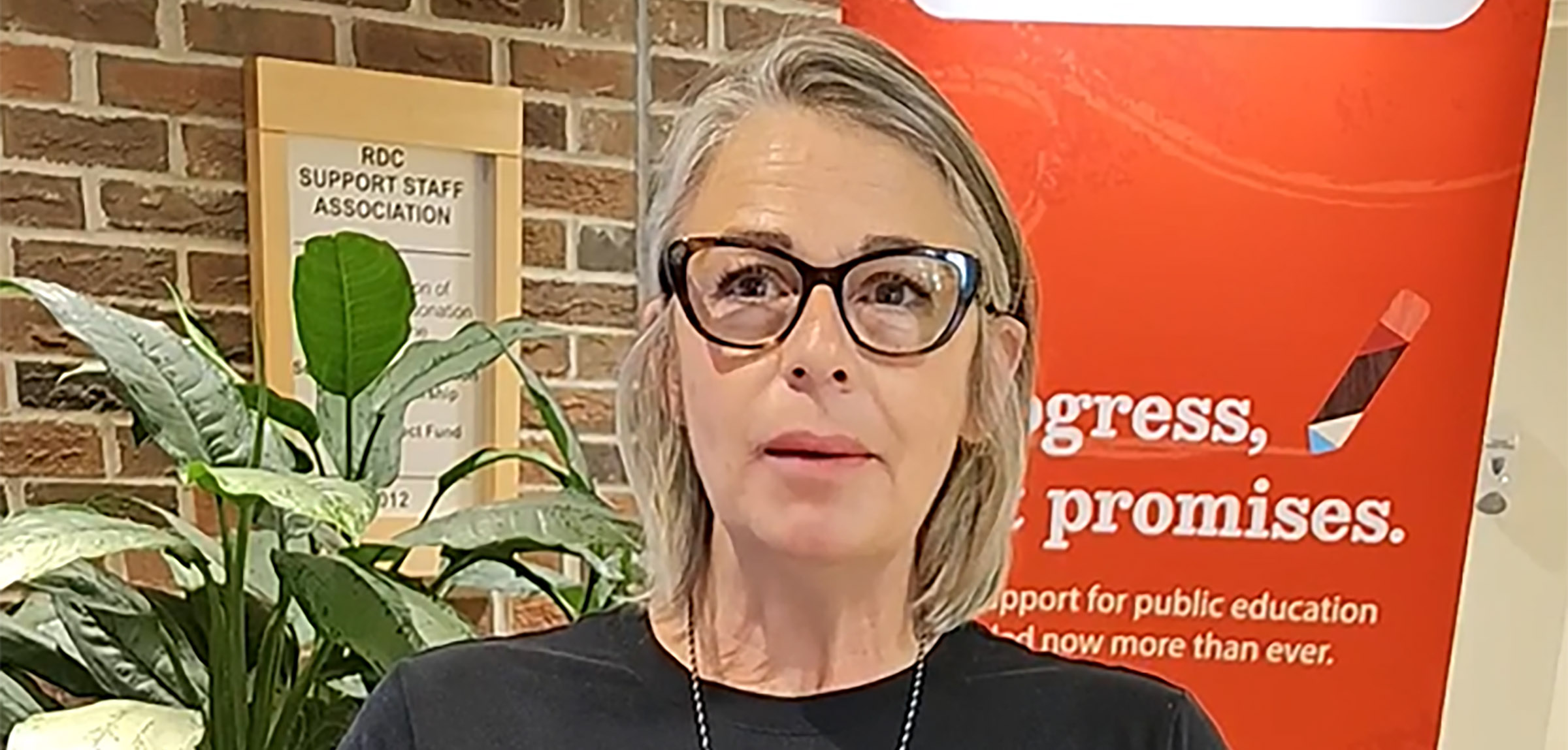 A teacher creates a video testimonial during a conference