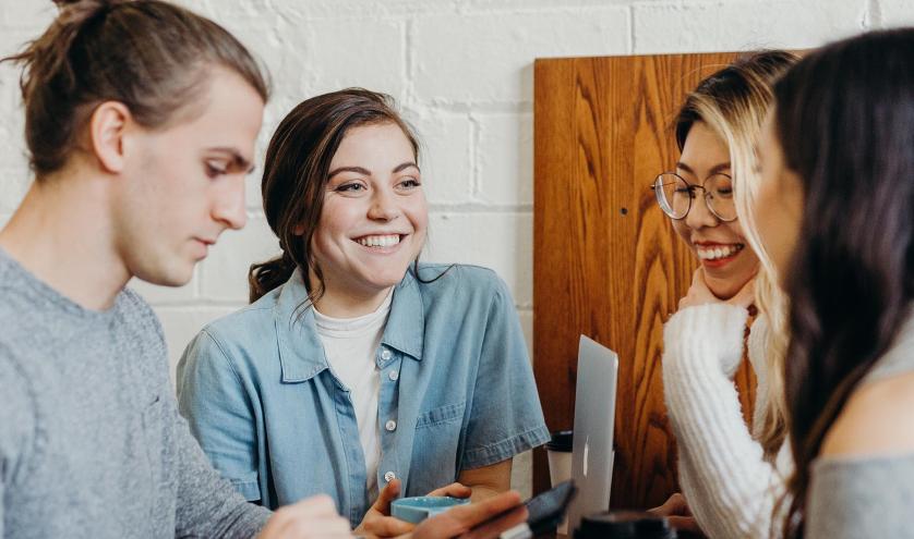 Four young teachers chatting