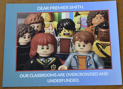 Event postcard with angry Lego people