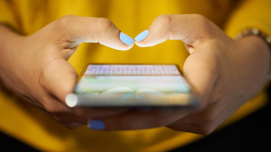 Yellow shirt Blue Nail Polish Smartphone