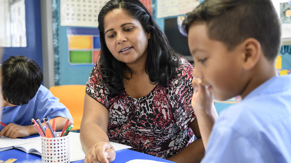 Female assisting students