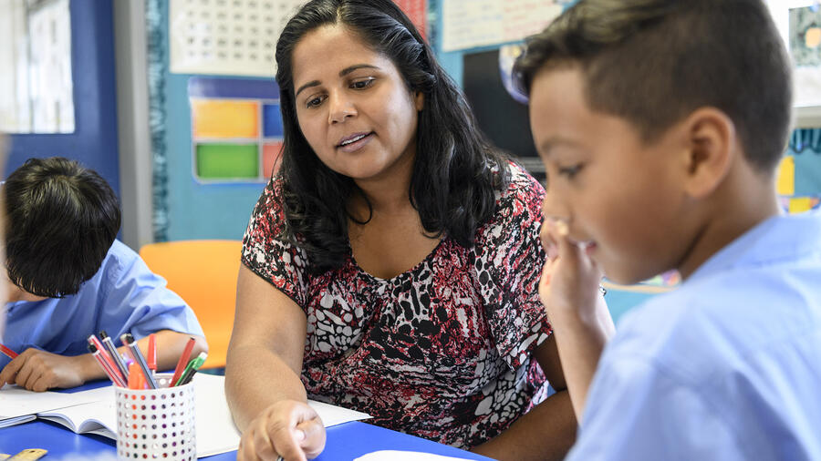 Female assisting students