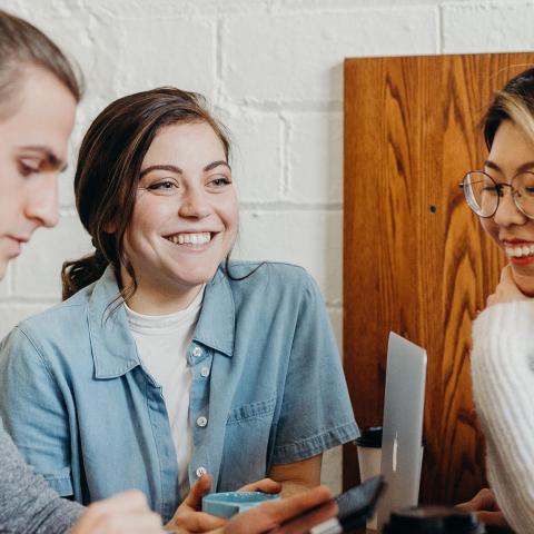 Four young teachers chatting