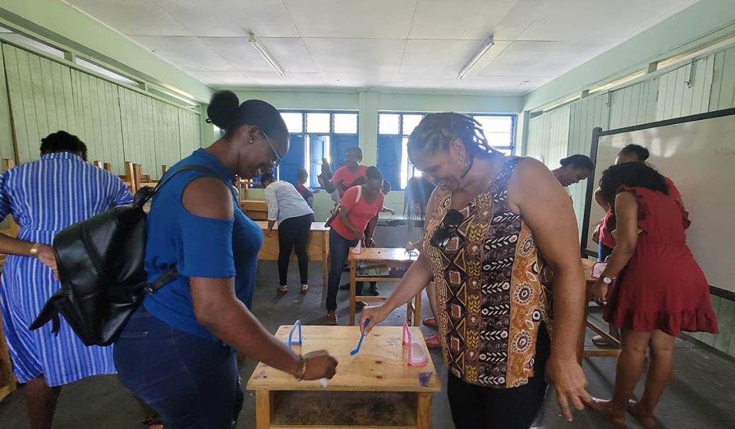 Caribbean teachers sample Canadian culture through table hockey.