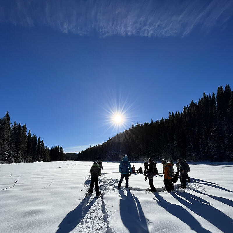 Students snowshoeing at Hogarth Lake in Kananaskis country