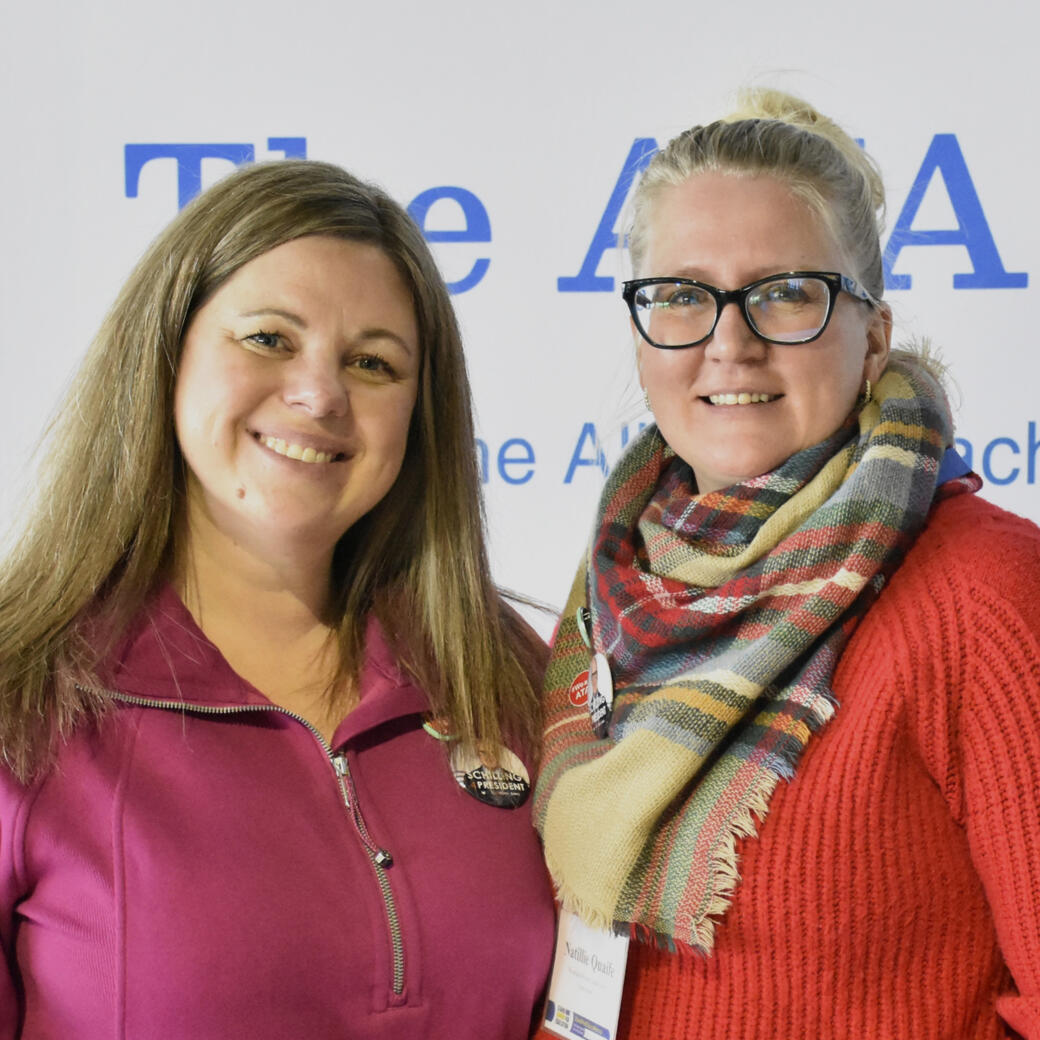 Two women attending a teachers' convention