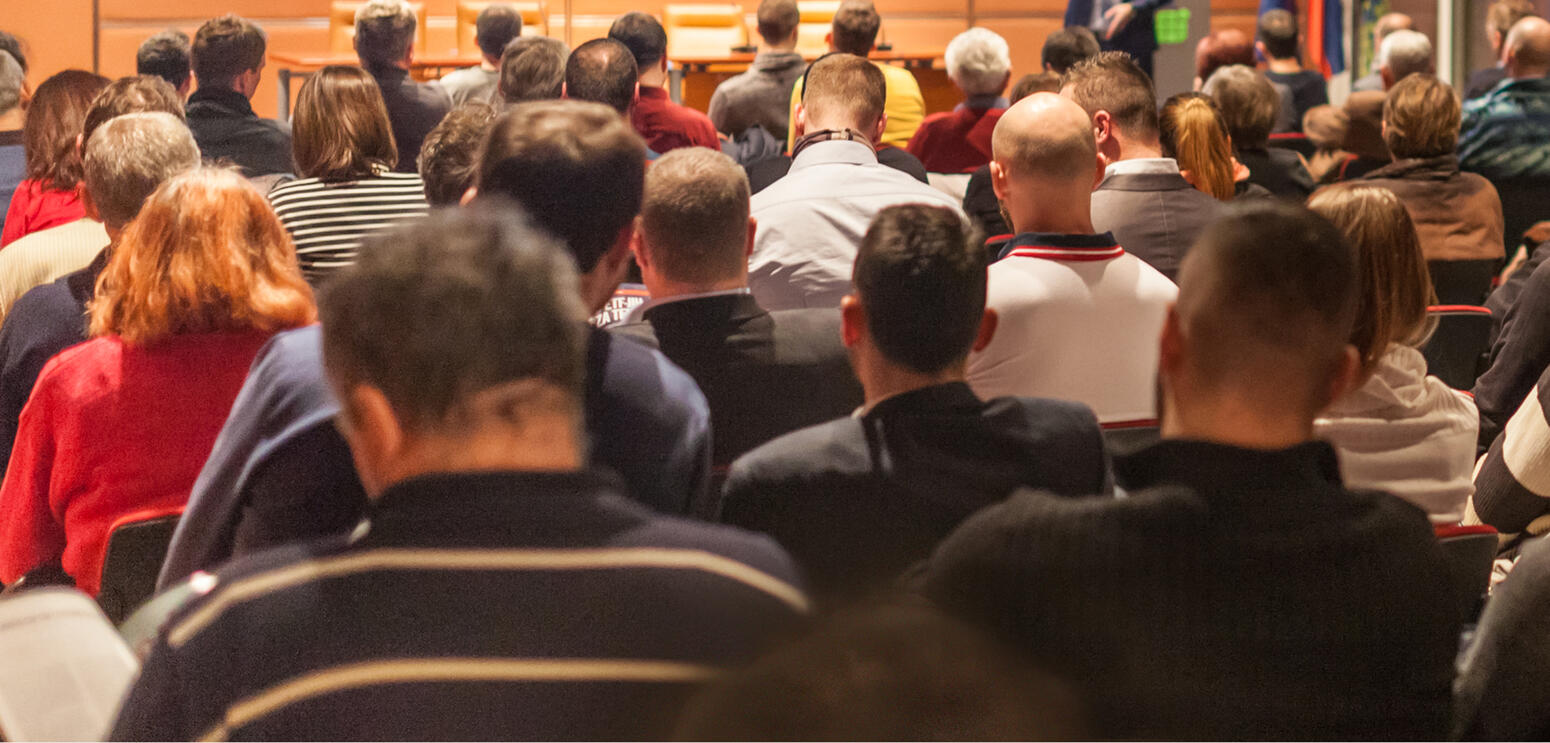Back of crowd at a conference