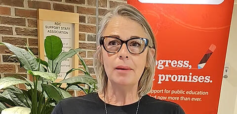 A teacher creates a video testimonial during a conference