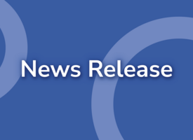 News Release on blue background with two light blue rings