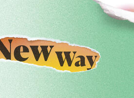 Image of a torn piece of paper with the words new way behind it