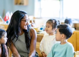 Teacher interacting with students