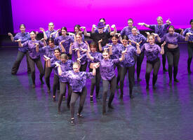 A group of dancers on stage