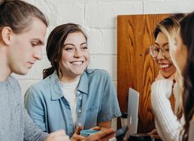 Four young teachers chatting