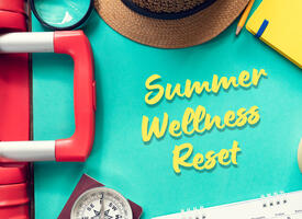 Suitcase, hat and magnifying glass