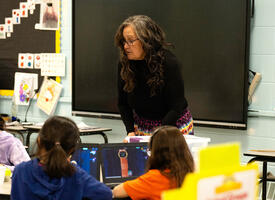 Female teacher at front of the classroom
