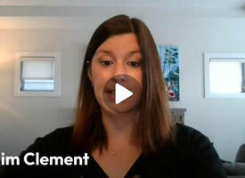 Still from a video testimonial made by a women with brown hair