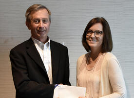 Lisa Fletcher accepts a draw prize