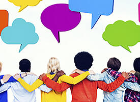 Row of people with their arms across each other's shoulders