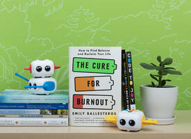 A photo of several books on a bookshelf