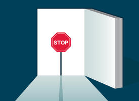 Cartoon image of an open book with a stop sign on the front page