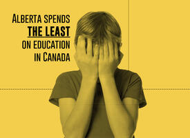 young boy covering his eyes