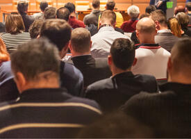 Back of crowd at a conference