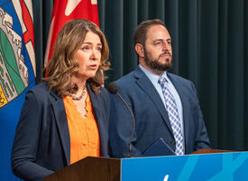 Danielle Smith and Demetrios Nicolaides give a news conference