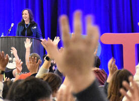 A speaker at a conference
