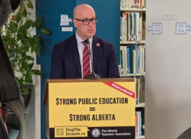 A passionate man speaking at a podium in a library