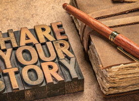 Block printing letters spell out Share your story