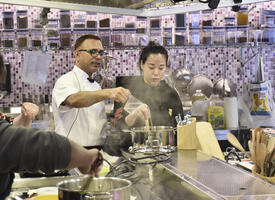 GETCA attendees participate in a cooking class