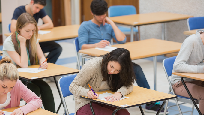 iStock-826928750_StudentsWritingExam
