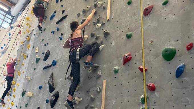 Climbers on an indoor climbing wall 