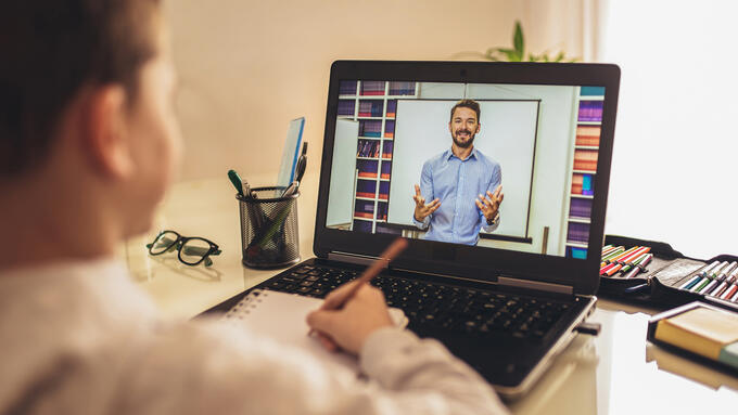 Elementary age boy in online class