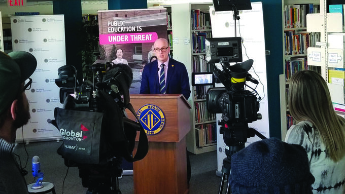 Jason Schilling gives a news conference