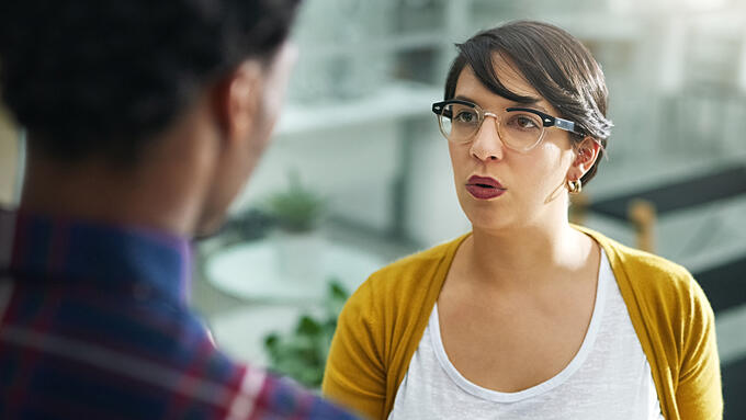 Teacher confronting another