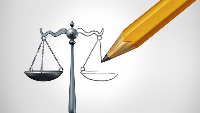 Pencil that points to a scale but is also drawing the scale.