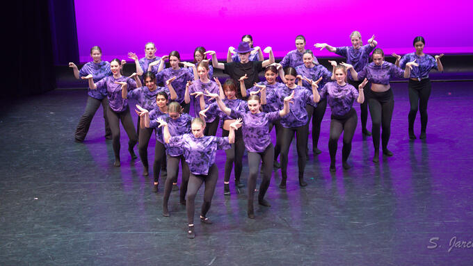 A group of dancers on stage
