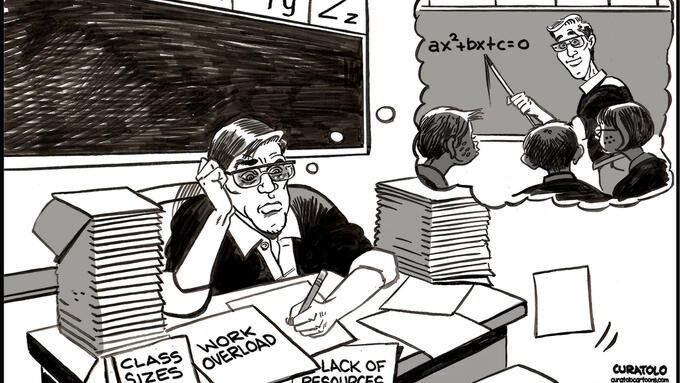 Teacher doing admin work while dreaming of teaching