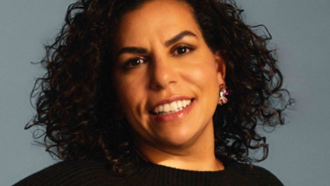 Portrait of women, Youssra Badr with curly black hair