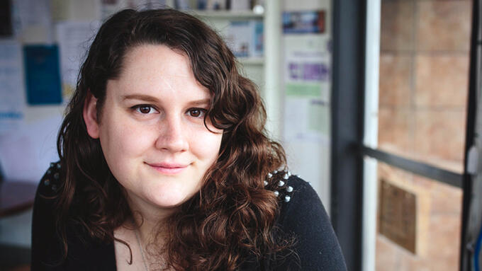 Portrait of a brunette curly haired women