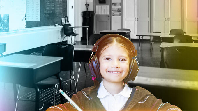 Girl wearing headphones in front of a black and white classroom