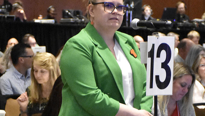 An ARA attendee listens in response to a question