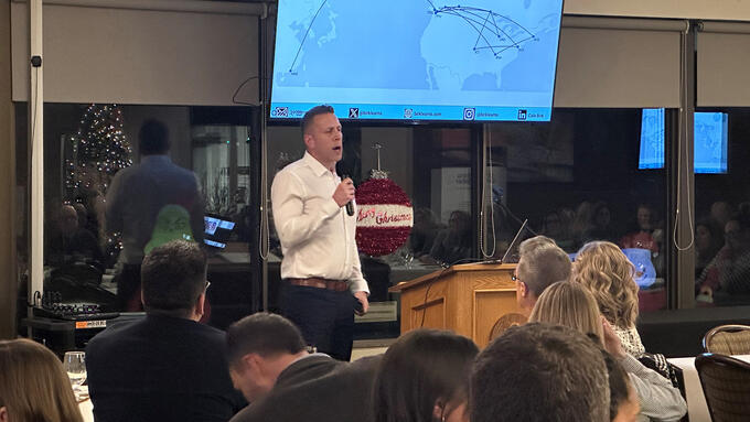 A presenter speaks at the leadership series